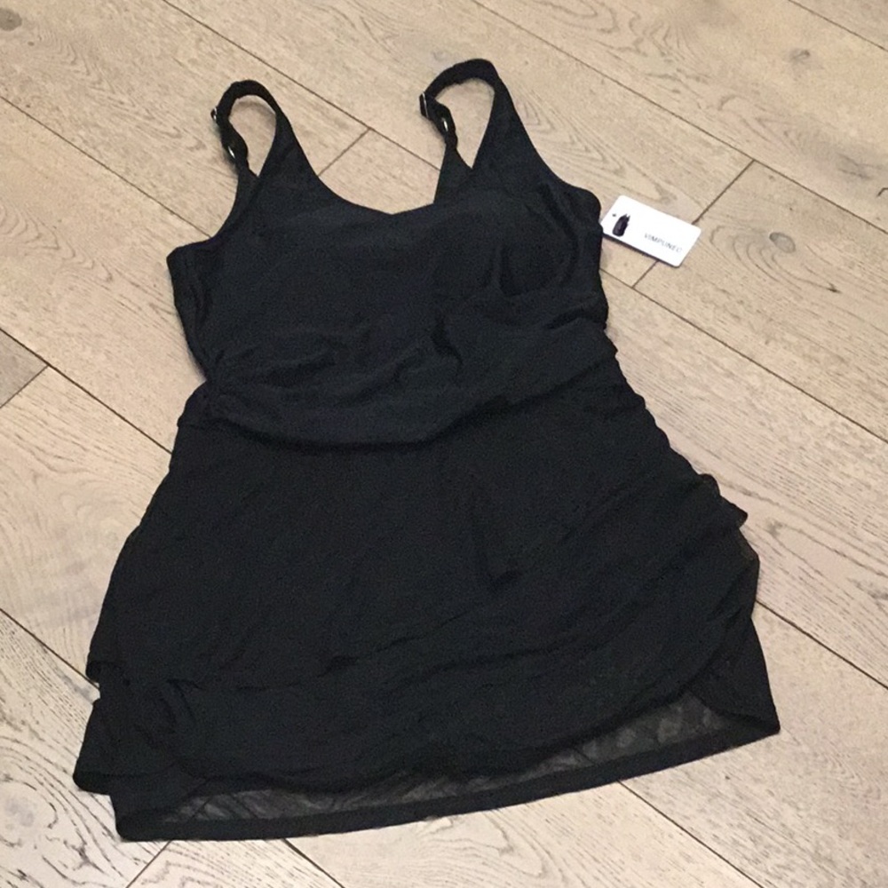 Woman’s Vimpunec black pull on swim dress. Large. Flirty skirt. Adjustable strap